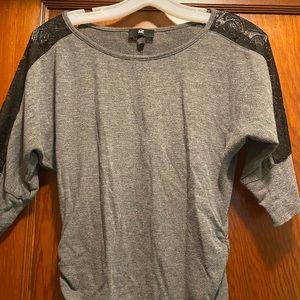 Gray quarter length sleeve shirt